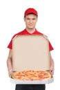 Pizza delivery. Cheerful young deliveryman holding a pizza box w