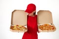 pizza delivery girl showing pizza inside boxes