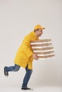 Pizza Delivery Guy Running on White Royalty Free Stock Photo