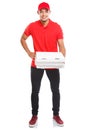 Pizza delivery latin man boy order delivering job full body portrait deliver box young isolated on white Royalty Free Stock Photo