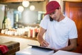 Pizza delivery man taking an order over the phone Royalty Free Stock Photo