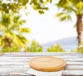 Pizza desk,red,white napkins on wooden table on blurred park background, food concept Royalty Free Stock Photo