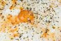 Pizza with egg yolk closeup Royalty Free Stock Photo