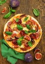 Pizza with figs, prosciutto