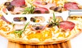 Pizza with ham, mushrooms ans salami Royalty Free Stock Photo