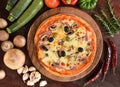 Pizza with ham, mushrooms and olives Royalty Free Stock Photo