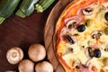 Pizza with ham, mushrooms and olives Royalty Free Stock Photo