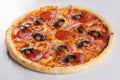 Pizza ham mushrooms pepperoni close-up side view isolated Royalty Free Stock Photo