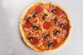 Pizza ham mushrooms pepperoni close-up top view isolated Royalty Free Stock Photo