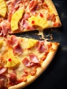 Pizza with ham, pineapples, and pineapple slices Royalty Free Stock Photo