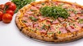 Pizza with ham, rucola, and vegetables on white background. Generative Ai Royalty Free Stock Photo