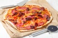 Pizza with ham, salami and chili pepper, Royalty Free Stock Photo