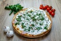 Pizza ham and sour cream white sauce cheese and dill top angle Royalty Free Stock Photo