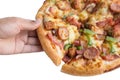 Pizza in hand isolate on white background Royalty Free Stock Photo