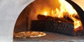 Pizza in hot firewood Oven for cook Royalty Free Stock Photo