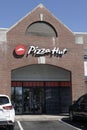 Pizza Hut restaurant. Pizza Hut is offering delivery, Carry Out and Curbside Pickup pizza and drinks Royalty Free Stock Photo