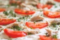 Pizza ingredients are closeup. Tomatoes, chicken, cheese, dill.