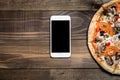 Pizza, Italian food delivery, call or order online on mobile, cellular, smart phone. Royalty Free Stock Photo