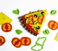 Pizza made from Craft paper. Ingredients for cooking. Processed cheese and tomatoes.