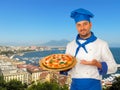 Pizza maker with margherita pizza in Naples Royalty Free Stock Photo