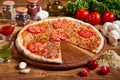 Delicious italian pizza served on wooden table Royalty Free Stock Photo