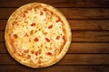 Pizza Margherita top view. Pizza margarita mozzarella cheese on wooden background for pizzeria banner. Flat lay