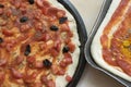 Pizza marinara with fresh tomatoes anchovies and olives Royalty Free Stock Photo