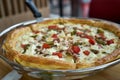 Pizza on a metal dish Royalty Free Stock Photo