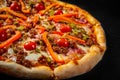 Pizza with Mozzarella cheese, Bolognese sauce, minced meat, pepper, tomato, bacon and vegetables. Royalty Free Stock Photo