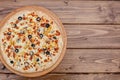 Pizza with Mozzarella cheese, chicken, olives, Spices . Italian pizza