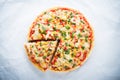 Pizza with mozzarella cheese, chicken, sweet corn, sweet pepper and parsley on white background top view Royalty Free Stock Photo