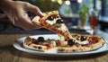 Pizza with mozzarella cheese and olives on wooden table