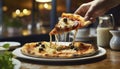 Pizza with mozzarella cheese and olives on wooden table