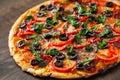 Pizza with Mozzarella cheese, salami, pepper, pepperoni, Tomatoes, olives, Spices and Fresh Basil. Italian pizza Royalty Free Stock Photo