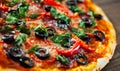 Pizza with Mozzarella cheese, salami, pepper, pepperoni, Tomatoes, olives, Spices and Fresh Basil. Italian pizza Royalty Free Stock Photo