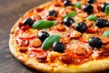 Pizza with Mozzarella cheese, salami, pepper, pepperoni, Tomatoes, olives, Spices and Fresh Basil. Italian pizza Royalty Free Stock Photo