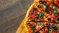 Pizza with Mozzarella cheese, salami, pepper, pepperoni, Tomatoes, olives, Spices and Fresh Basil. Italian pizza Royalty Free Stock Photo