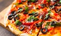 Pizza with Mozzarella cheese, salami, pepper, pepperoni, Tomatoes, olives, Spices and Fresh Basil. Italian pizza Royalty Free Stock Photo