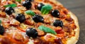 Pizza with Mozzarella cheese, salami, pepper, pepperoni, Tomatoes, olives, Spices and Fresh Basil. Italian pizza Royalty Free Stock Photo