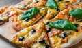 Pizza with Mozzarella cheese, Tomatoes, pepper, olive, Spices and Fresh Basil. Italian pizza. Pizza Margherita or Margarita on woo Royalty Free Stock Photo