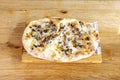 Pizza with mushrooms, mozzarella cheese, olive oil and thin Royalty Free Stock Photo