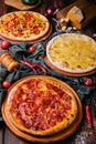 Pizza party dinner or three delicious pizzas Royalty Free Stock Photo