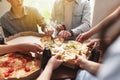 Pizza party, group of friends chatting, eating pizza, drinking sweet soda water Royalty Free Stock Photo