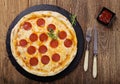 Pizza peperoni on stone black try Royalty Free Stock Photo