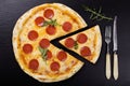 Pizza peperoni on stone black try Royalty Free Stock Photo