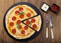 Pizza peperoni on stone black try Royalty Free Stock Photo