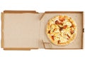 Pizza with pepperoni, pork, mozzarella cheese, tomato sauce and Italian herbs in open cardboard box. Top view Royalty Free Stock Photo