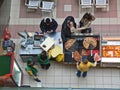 Pizza pieces vendor seen from above. Fast food and fast life. Royalty Free Stock Photo
