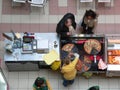 Pizza pieces vendor seen from above. Fast food and fast life.