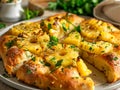 A pizza with pineapples and herbs on top Royalty Free Stock Photo